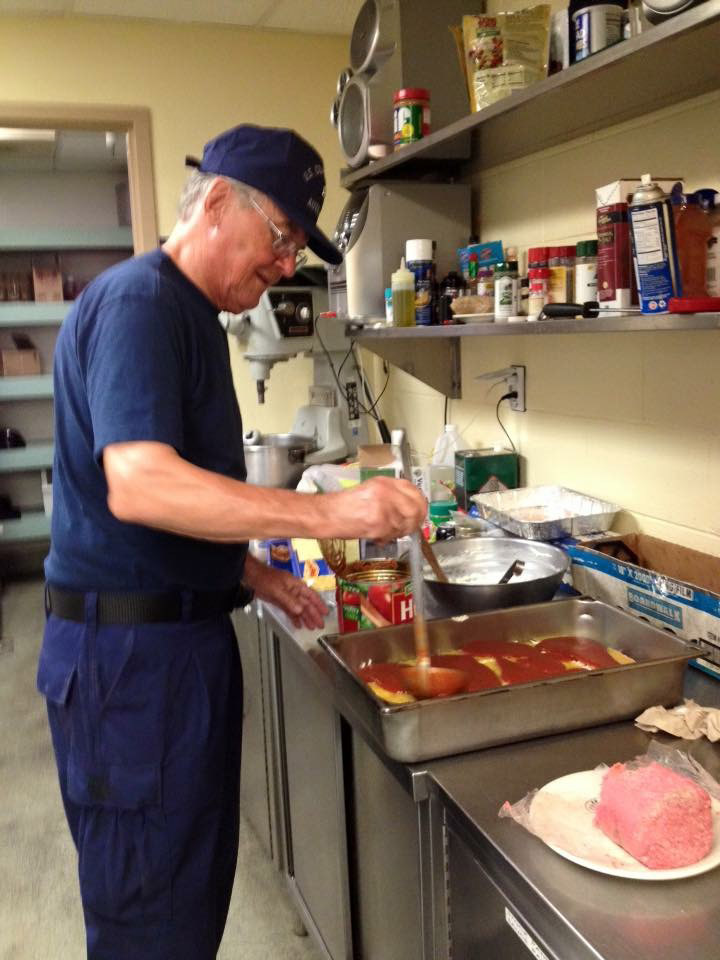 AuxFS Member cooking at Coast Guard Station Cortez